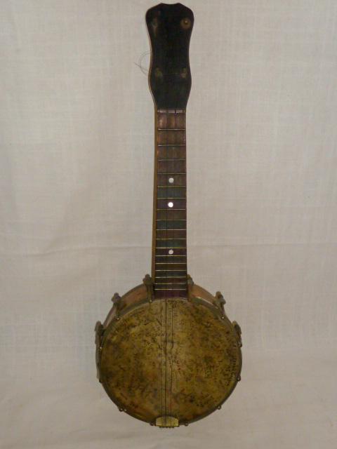 Folk Art Uke Banjo 1923 College Fraternity/Sororities: Wonderful Folk Art Uke Banjo. A Great Piece Dated July 7 , 1923 going from New York to Asbury , Uke head/sin is full of signatures and sororities symbols and even a train schedules . Banjo Neck Says: 