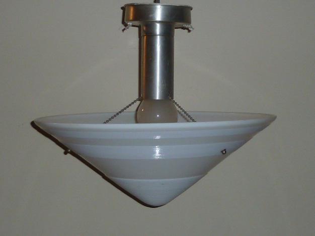 Art Deco Gil Glass Conical Shape Dish Light: 1930's Art Deco heavy cast milk glass dish pendant light with bands of concentric grooves. Canopy has three chains attached to the dish shade. Shade is signed Gill Glass & Fix Co Phila. Pa. , and meas