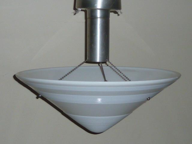 Art Deco Gil Glass Conical Shape Dish Hanging Light: 1930's Art Deco heavy cast milk glass dish pendant light with bands of concentric grooves. Canopy has three chains attached to the dish shade. Shade is signed Gill Glass & Fix Co Phila. Pa. , and meas