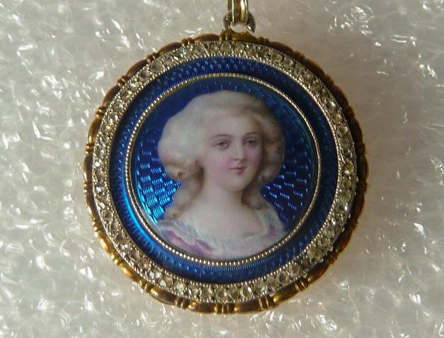 18kt Guilloche Cobalt Enamel Portrait Diamond Necklace: 18kt. Antique guilloche enamel diamond portrait pendant/locket on 18kt chain. Chain measures 15" long. Round pendant is 15/16" across. Has a diamond surround and diamond bail. Back opens. No damage to
