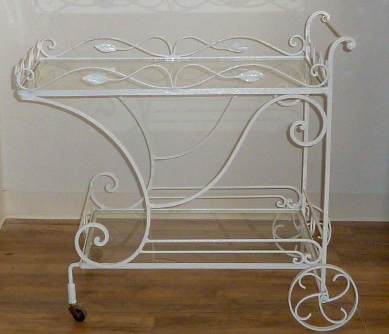 Vintage Mid-Century Wrought Iron Tea Bar Serving Cart: Scrolling leaf motif adds a distinctive look to this vintage mid-century rolling tea / bar cart. Unsigned but probably made by Woodard . Two tiered design with an individual look just for you... Measu