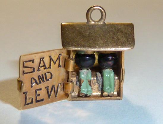 14kt 3D Movable Articulate Sam and Lew Outhouse Charm: One of many three dimensional , movable , articulate 14kt Gold charms in this sale. This fun gold charm features a 3D outhouse with hinged door that opens to reveal Sam & Lew sitting inside. Outhouse 
