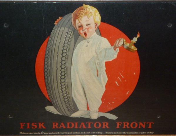 Fisk Tire Co. Advertising Sign 1926 Fisk Radiator Front: Scarce Fisk 1926 Radiator Advertising Piece. Image is Iconic Fisk sleepy Boy Holding a Tire. Bottom Reads Fisk Radiator Front. At very Bottom Are Instructions on how to apply this piece to the front o