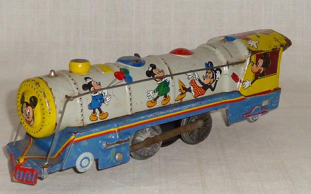 Marx Mar Lines Disney Meteor wind up train: Marx Mar Lines Mickey Mouse Meteor wind up train. This Mar Lines Meteor wind up toy train engine is part of a rare Disney Mickey train set. Marked copyright Walt Disney Productions. Train dates to lat