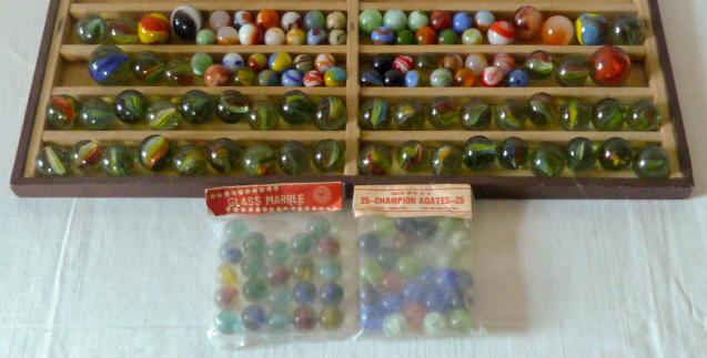 Over 100 Early Vintage Marbles: Vintage Marbles in lot of over 100 pieces. Great opportunity For those who Know Marbles. All from one Collection. As found estate condition . Please use photos as part of the description. The absence