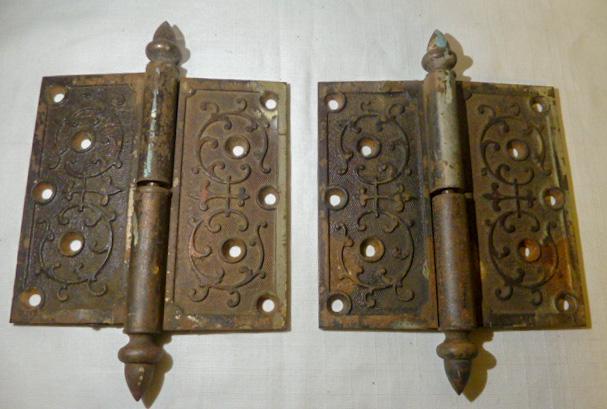 1870's Door Hinges Large 6” Ornate Iron Pair: Pair of 1870's Ornate iron Door Hinges . Plate closed Measures 6” high by 6” when open . 9” high with Pin . Hinges are heavy Iron very Ornate. Stamped on back 1869 – 1870 . Ori