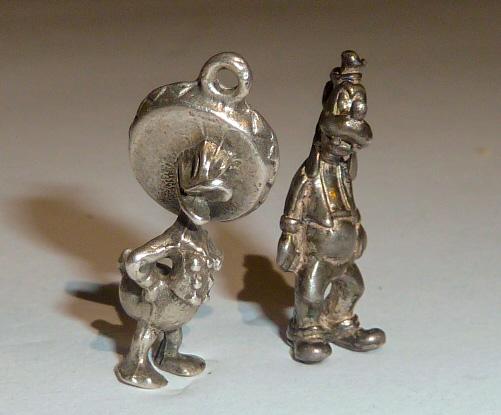 Walt Disney Sterling 3D Charms Donald & Goofy: Vintage sterling silver Disney Goofy and Donald from the Disney Movie Three Caballeros bracelet charms . There are other Disney sterling charms in this saleâ€¦. As found estate condition . Please