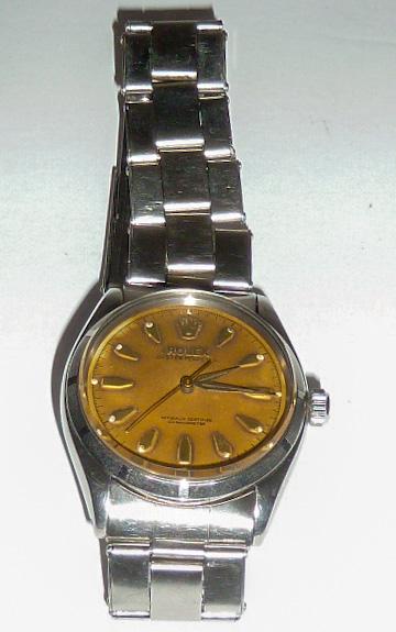 Rolex Oyster Perpetual Chronometer Butterfly Wristwatch: BK 6565 1.57 # D713219 Movement# 1030 (Butterfly) . Case 6565 , #231512 . 1957 . Illuminate numerals stainless band. Sure to please. As found estate condition . Please use photos as part of the descri