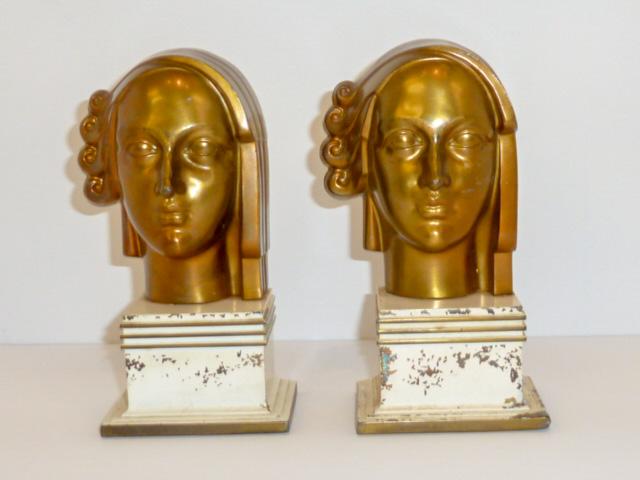 Art Deco All Metal Art Ware - Women's Head Bookends: Art Deco female bookends signed with partial label , All Metal Art Ware. Wear commesurate with age and use. Mearurs 6 3/4" tall by 3" wide and 2 1/4" deep. As found estate condition . Please use photo