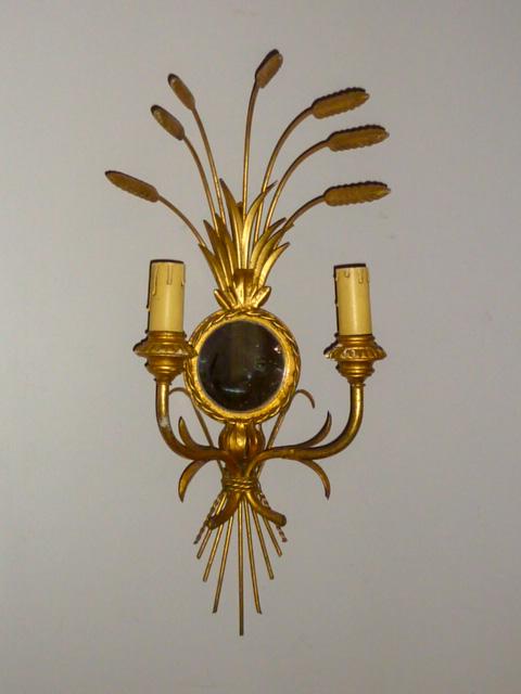 French Gilded Metal Sconce Light with Mirror: Metal spray of gilded wheat emerges from the top of round banded mirror , that is embraced by two electric candlesâ€¦ Measures 21" tall and 10" wide. As found estate condition . Please use photos 
