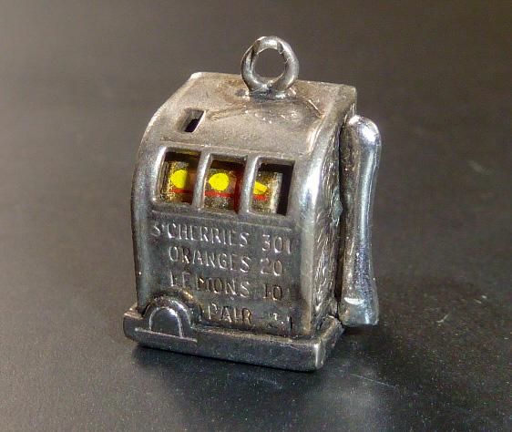 Vintage Sterling 3D Articulate Slot Machine Charm: Vintage Sterling silver working 3 D "slot machine" means youâ€™re a winnerâ€¦ As found estate condition . Please use photos as part of the description. The absence of a condition report does 