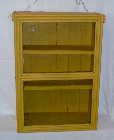 1900's Cabinet Mustard Paint: Barn find… Wavy split glass front door , two shelf wainscoat cabinet , mustard paint. Measures 30" tall by 22 1/2" wide and 11 1/2" deep. As found estate condition . Please use photos as part of