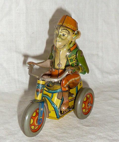 U.S. Zone Germany Monkey in Fez Riding Tricycle (1 of 7)