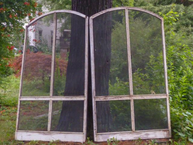 Pair 1920's Wood Arched 88" Tall Screen Door/Window: Found in barn in upstate N.Y. this is a pair of architectural 88" tall by 52" wide and 1" deep arched screens/doors.One side has molding to hold in the screen (See Photos) . They are ready to be used 