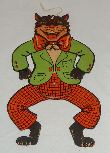Scarce Early Halloween Articulated Jester Cat: Halloween scary cat early vintage is a scarce beautiful piece. Cat measures 12" from ear tip to toe and 7" at its widest point. Jester Cat if articulated. Very nice example of a hard to find early Hal