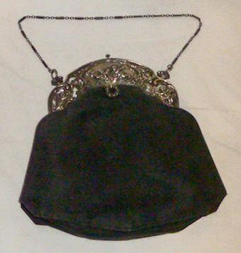 Victorian High-End Satin Bag w/Reposse Putti Frame: Victorian silver plate, satin bag/purse with reposse putti frame. No damage. Impressive condition. As found estate condition . Please use photos as part of the description. The absence of a condition 
