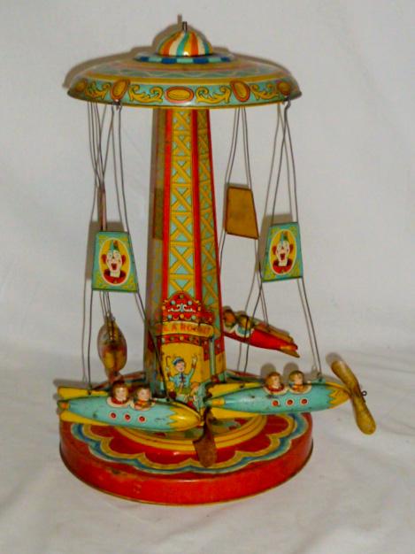 1950's Chein Ride-A-Rocket Tin Windup Toy (1 of 7)