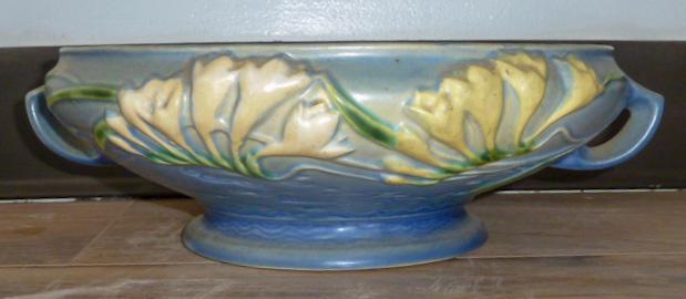 1945 Roseville Pottery Freesia Compote Blue Bowl 7-10": Original Roseville Freesia Compote, introduced in 1945, Measures 13" and 3 3/4"high . Mold mark on bottom 7-10". I see no damage . As found estate condition . Please use photos as part of the descript