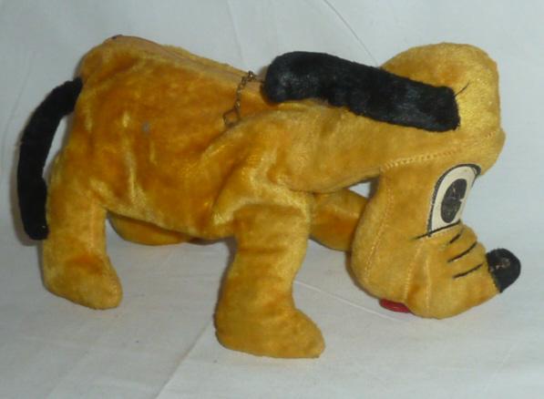 1930's Gund Mfg. Plush Walt Disney Pluto Purse: Walt Disney's Adorable Pluto Purse . All original, Plush Toy from Gund Manufacturing circa 1930's . Zipper on back . Has original Ear Tags. Measures 11" long. As found estate condition . Please use ph
