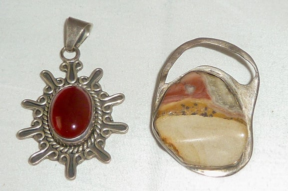 Vintage Sterling Silver CII Mexico Red Carnelian Agate Starburst Pendant & Artisian Made Silver with: Starburst pendant measures 1 3/8" wide by 1 3/4" Signed on back. The artisian pine measures1 1/8" wide by 1 3/4" . I see no damage or repairs. As found estate condition . Please use photos as part of 