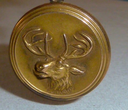 Antique Pocket Watch Elk FOB/Locket Pendant: This antique pocket watch hinged Elk FOB/locket pendant. The top lid has a beautiful raised Elk design, opens from the side and holds a double photo.Inside is signed but it's to faint to make out. Mea