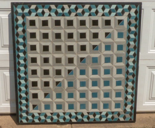 Woodstock Artist - Large Hanging Geometric Mosaic Tile ArtWork - Framed: Geometric mosaic artwork , depicting symmetry , duality , dimension , this work of art says it allâ€¦ found hanging on the wall in artist's Woodstock home. Dimensions 37 1/2" square, in a thick bl