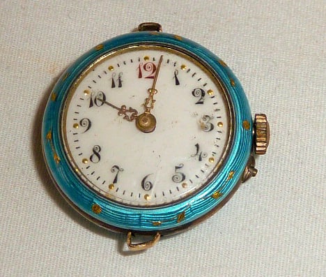 Guilloche Enameled 800 Silver Argent Ladies Pocket Watch: This is an elegant and exquisitely crafted antique pocket watch featuring a dazzling turquoise blue guilloche enamel back . The dial is framed by a wide border of turquoise guilloche enamel and flowin