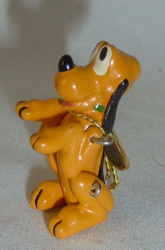 Vintage Miniature Hantel Pewter - Disney - Pluto Figurine - Jointed - Scotland - Hand Painted: Very sought after high-end pewter Mickey Mouse figurine with jointed arms and legs. Has the original Hantel tag. Hand painted. Made in Scotland. I have two other Disney figurines in this auction: Mick