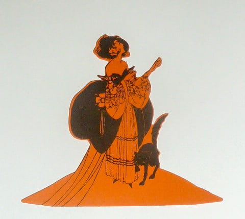 Vintage Figural Buzza Co Halloween Place Card - Woman in Costume with Black Cat: 1930's Halloween Figurative Place Card . Figural card shows a woman in costume with a black cat at her heels. Cards are elaborately done and are cut-outs of a deep rich black on orange color . Cards a
