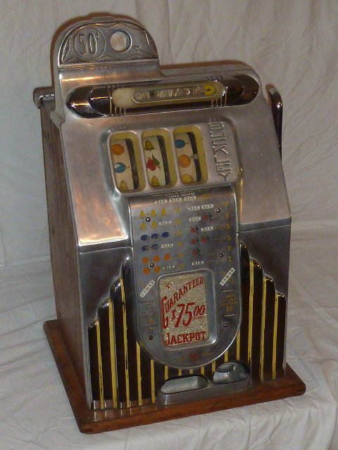 Antique mills 50 cent slot machine with key Antique mills 50 cent slot machine with key
