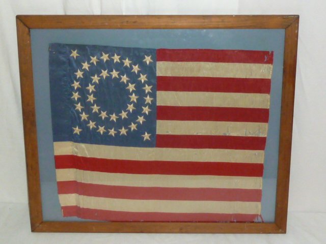 38 STAR 2ND CORP/REGIMENT SILK AMERICAN FLAG: SHOWING A 38 STAR 2ND REGIMENT /CORP SILK AMERICAN FLAG . CANTON INCLUDES 34 STARS IN THE TYPICAL TWO CONCENTRIC CIRCLES THE NUMBER 2 IS IN THE CENTER OF THE CIRCLES ADDITIONAL STAR IN EACH CORNER . S