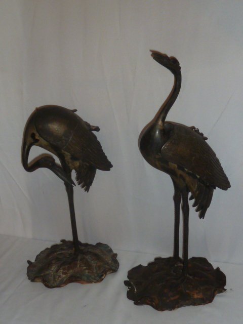 PR. 19TH CENTURY ORIENTAL BRONZE CRANES: SHOWING A PAIR OF 19TH CENTURY ORIENTAL BRONZE CRANES . MEASURE 25".AS FOUND ESTATE CONDITION.PLEASE USE PHOTOS AS PART OF THE DESCRIPTION. THE ABSENCE OF A CONDITION REPORT DOES NOT GUARANTEE EXCELLE