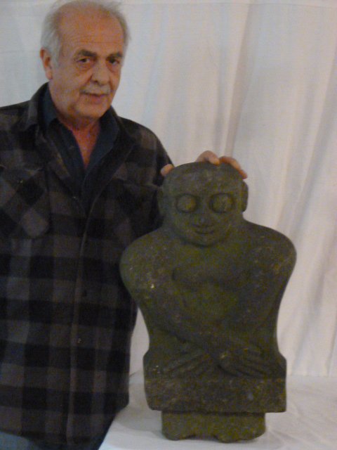 19TH C. CARVING OF A MAYAN GODLIKE STATUE: SHOWING A 19TH C. STONE CARVING OF A MAYAN GOD LIKE STATUE . MEASURES 22" BY 14" . AS FOUND ESTATE CONDITION.PLEASE USE PHOTOS AS PART OF THE DESCRIPTION. THE ABSENCE OF A CONDITION REPORT DOES NOT GU