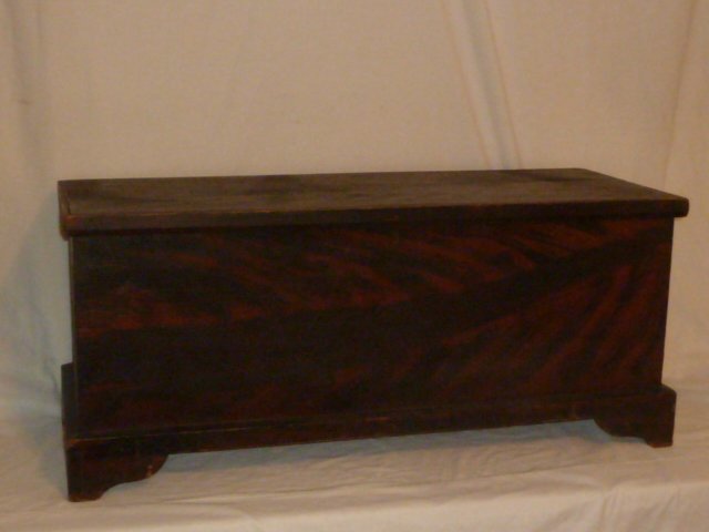 1860'S FLAME DECORATED SIX BOARD BLANKET BOX: SHOWING A AMERICAN CIRCA 1810 SIX BOARD BLANKET BOX , FLAME DECORATED , CUTOUT BASE . MEASURES 40" X 15" X 17" . PLEASE USE PHOTOS AS PART OF THE DESCRIPTION. THE ABSENCE OF A CONDITION REPORT DOES NO