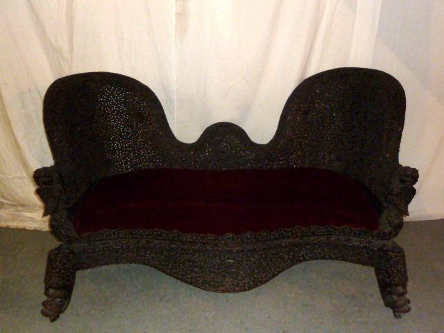 19TH CENTURY BURMESE CARVED WOOD SETTEE: SHOWING A 19TH CENTURY BURMESE CARVED ROSEWOOD SETTEE . MEASURES .PLEASE USE PHOTOS AS PART OF THE DESCRIPTION. THE ABSENCE OF A CONDITION REPORT DOES NOT GUARANTEE EXCELLENT CONDITION.PLEASE CONTACT 