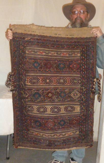 PERSIAN BAG FACE HAND KNOTTED WOOL: SHOWING A HAND KNOTTED PERSIAN BAG FACE . MEASURES 31" X 47" . PLEASE USE PHOTOS AS PART OF THE DESCRIPTION. THE ABSENCE OF A CONDITION REPORT DOES NOT GUARANTEE EXCELLENT CONDITION.PLEASE CONTACT US 