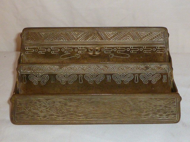 TIFFANY STUDIOS AMERICAN INDIAN PATTERN LETTER RACK: SHOWING A TIFFANY STUDIOS NEW YORK 1186 DORE BRONZE LETTER RACK / HOLDER IN THE "AMERICAN INDIAN" PATTERN .ONE OF THREE TIFFANY "AMERICAN INDIAN" PATTERN PIECES IN THIS SALE.MEASURES 5 3/4" TALL BY 11