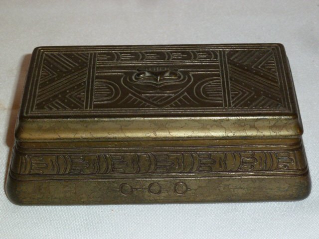 TIFFANY STUDIOS AMERICAN INDIAN PATTERN COVERED BOX: SHOWING A TIFFANY STUDIOS NEW YORK 1192 BRONZE COVERED BOX / STAMP BOX IN THE "AMERICAN INDIAN" PATTERN .THIRD OF THREE TIFFANY "AMERICAN INDIAN" PATTERN PIECES IN THIS SALE . MEASURES 5 1/2" WIDE BY 