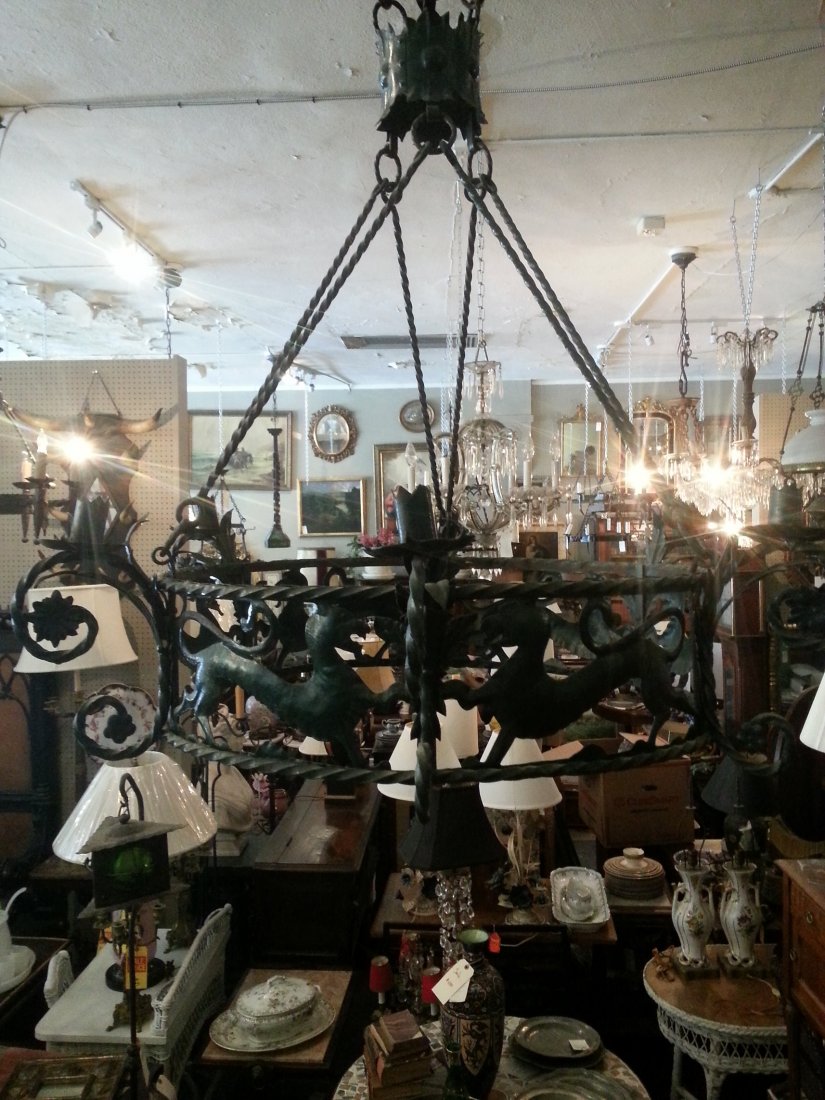 Green iron dragon chandelier: Large green iron dragon chandelier with design of flowers and leaves.53" HT X 30" Diam, not electrified
