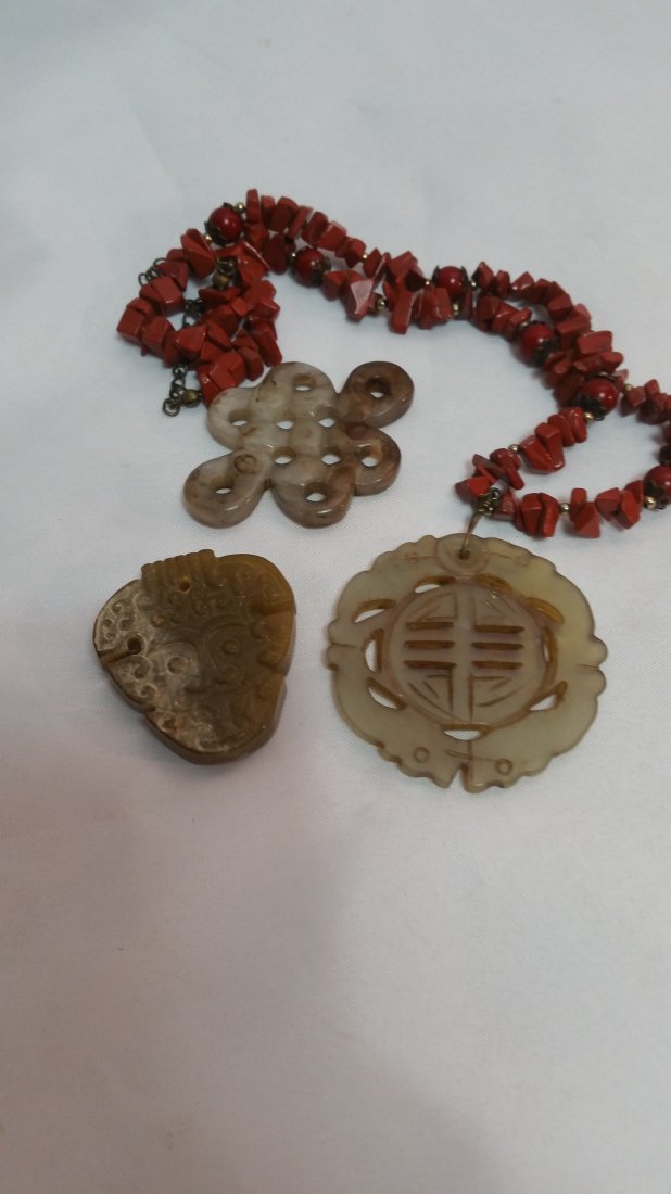 Chinese jade lot: lot of 3 hand carved Chinese jade pendants.