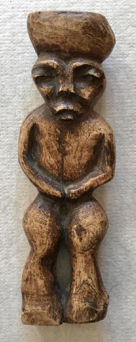 Early Carved Ancestral Spirit Fetish, 8"hgt.: Antique hand-carved tribal bone ancestor spirit fetish. Dimension: 8" hgt. x 2.6"wd. Condition: good condition, age appropriate. Provenance: originally acquired during the 1940's, Boston, MA estate
