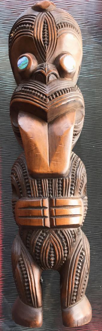 Maori Carved Wood Figural Tiki, New Zealand,1959: Maori Tekoteko* hand carved wood tiki, dated and signed by the carver,1959. Tekoteko, Maori tribal ancestors. Dimension: 14.6" x 4". Carved wood with paua shell eyes. Signed and dated, Rotorua, New Ze