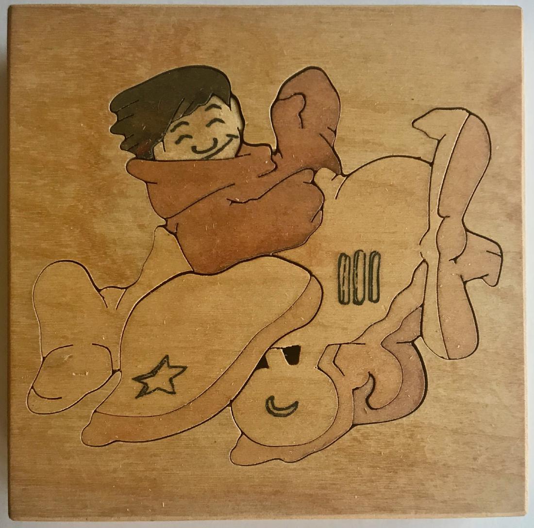 MICKEY Limited Hand-Cut & Painted Jigsaw Puzzle Sendak: Maurice Sendak "MICKEY" hand cut and painted limited edition period wood jigsaw puzzle, 1999. Design is based upon Sendak's book IN THE NIGHT KITCHEN. Limited Edition 34 / 52. View information details