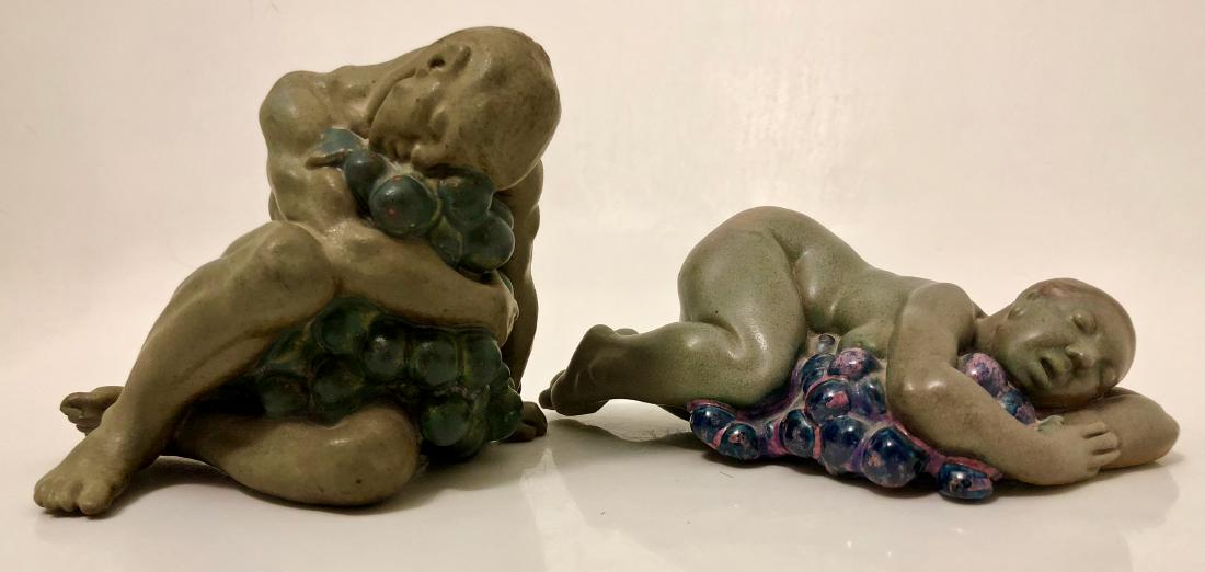 Kai Nielsen WINE HARVEST Stoneware Figures: Kai Nielsen (Danish, 1882-1924). Pair of Kai Nielsen BING & GRONDAHL WINE HARVEST STONEWARE FIGURES (Vinhosten) ca.1912. Title: Despondent Man With Grapes. Matte glazed stoneware. Dimensions: height: