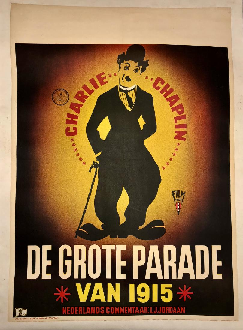 Vintage Charlie Chaplin DE GROTE PARADE Poster 1915: Vintage linen back DE GROTE PARADE poster. Grand Marshal CHARLIE CHAPLIN. Dimensions: linen: 29.6 in. x 21 in.; image: 27.6 in.x 19.5 in. Condition: good original linen back condition. Provenance: pri