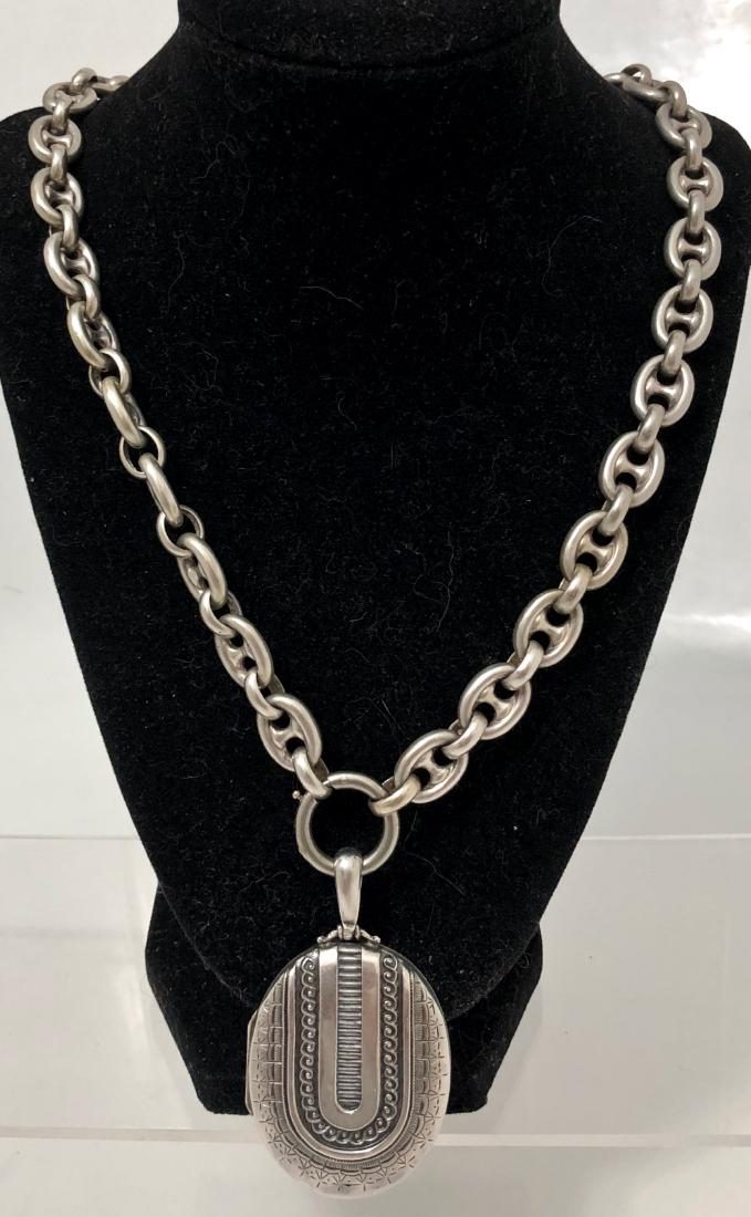 Antique Sterling Photo Locket Necklace Birmingham 1882: Antique Victorian Birmingham England sterling silver locket photo pendant suspended from a marine link collar chain with extension dropper & bolt clasp. British Hallmarks: Birmingham 1882 E.B (Edward 