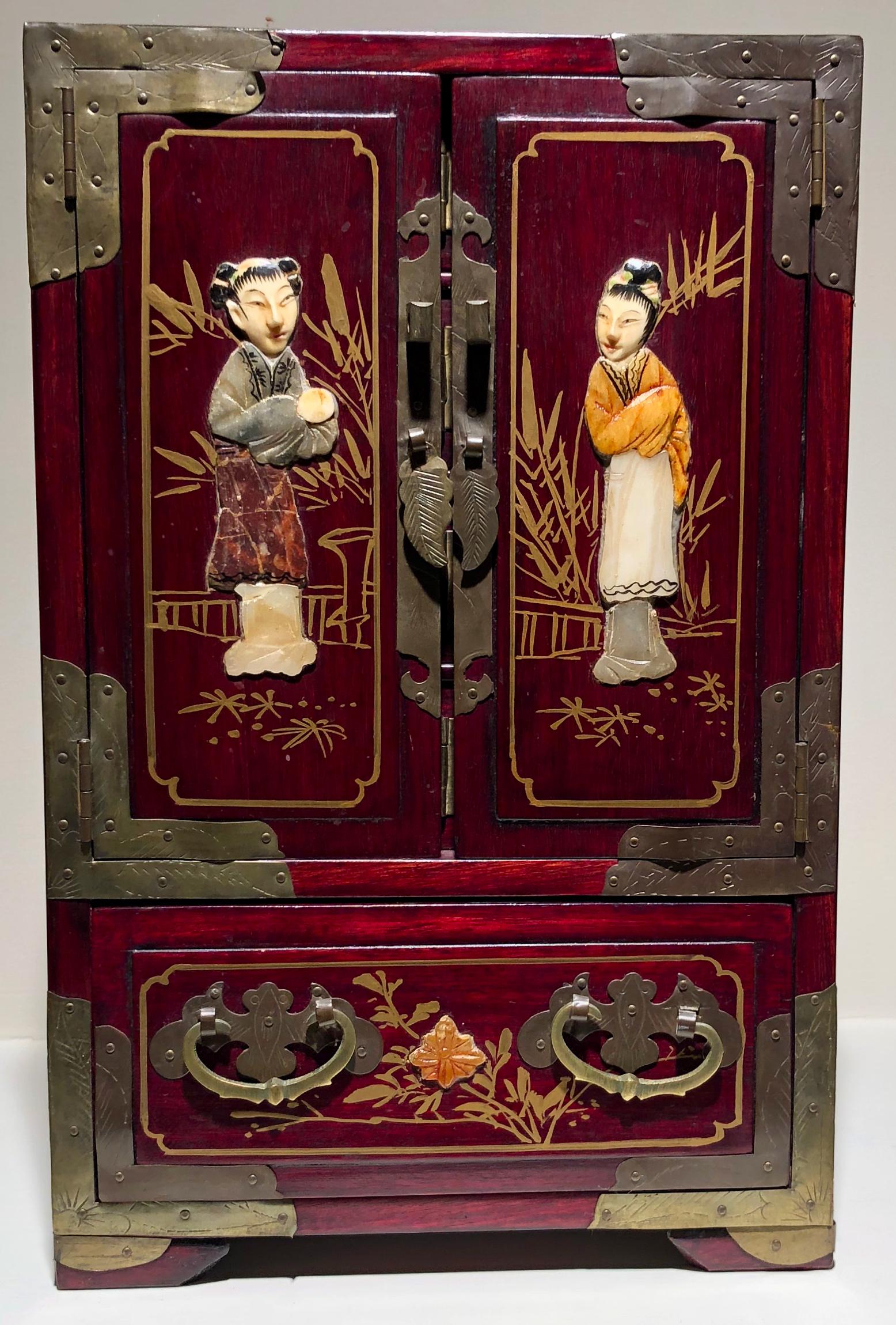 Chinese Carved Wood Lacquer Jewelry Box c.1930s: Antique Chinese wood lacquer jewelry cabinet box with hand carved and painted bone figures and brass fittings. Five fitted trays lined in red silk with top outside brass handle for travel. All five dr