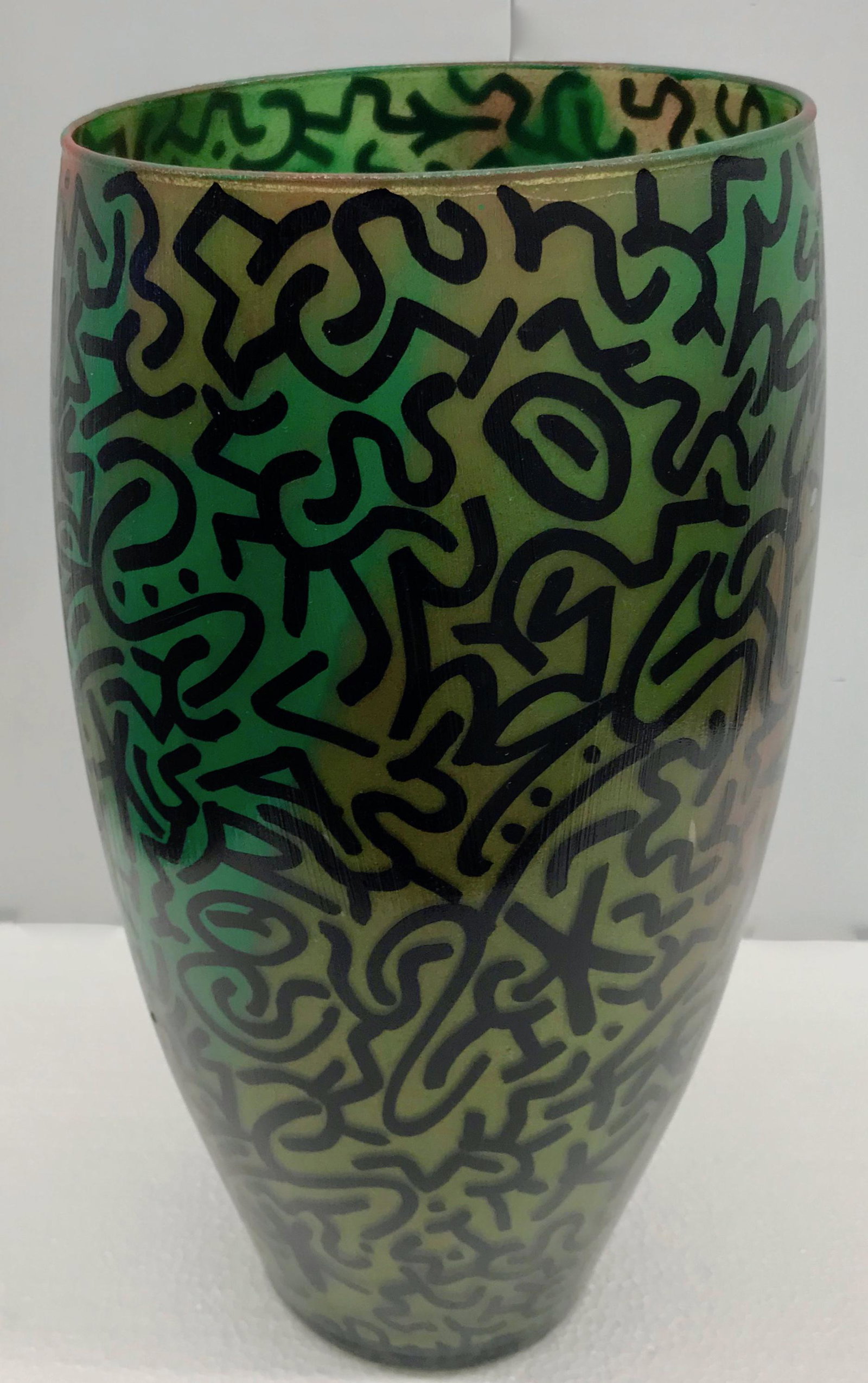 LA Ii Graffiti Art Glass Vase Tagged Throughout: LA II (Angel Ortiz) urban graffiti Art Glass Vase, tagged throughout and signed by the artist LA II on base (which he rarely does). Spray and paint markers on glass. Dimension: Height: 15 1/4 in. Open