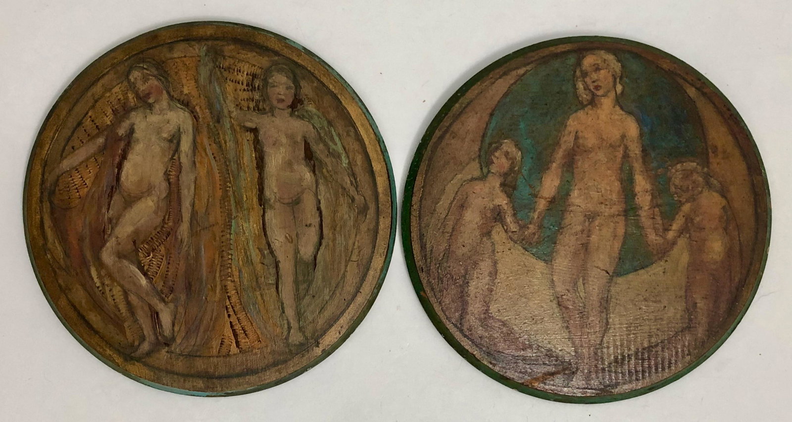 Grace Prudent Neal (American, b.1876-1961) Nudes, 1921: Pair of painted nudes on wood panels, signed by the artist, Grace Neal. Mixed media with sgraffito on wood panel, signed and dated on verso, Grace Neal, 1921. Dimension: diameter: 9 1/2 in. Condition: