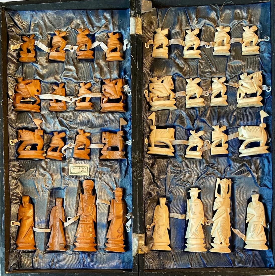 Chinese Carved Bone Chess Set W/ Board Box,1920s: Antique hand-carved Chinese bone chess set with folding wood board box. Carved bone chess pieces with board in a silk lined presentation box. Complete 32 pieces in fitted interior hinged folding playi